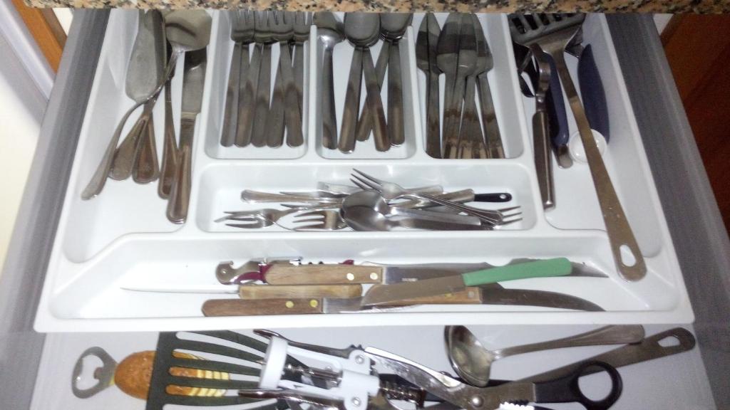 a drawer full of utensils in a refrigerator at Casa Lola in Agaete
