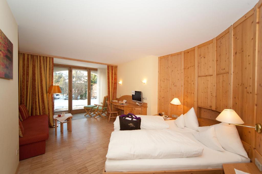 Postel nebo postele na pokoji v ubytování Naturhotel Ortners Eschenhof