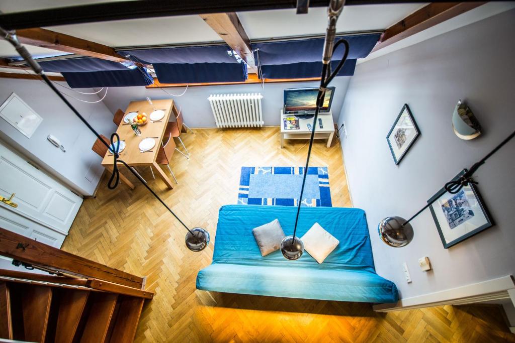 an overhead view of a bedroom with a swing at Ruterra Red Roofs View With Garage in Prague