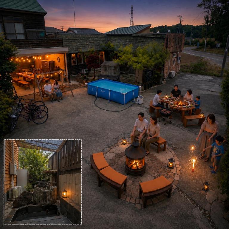 a group of people sitting around a fire pit at AJITO Chigasaki in Chigasaki