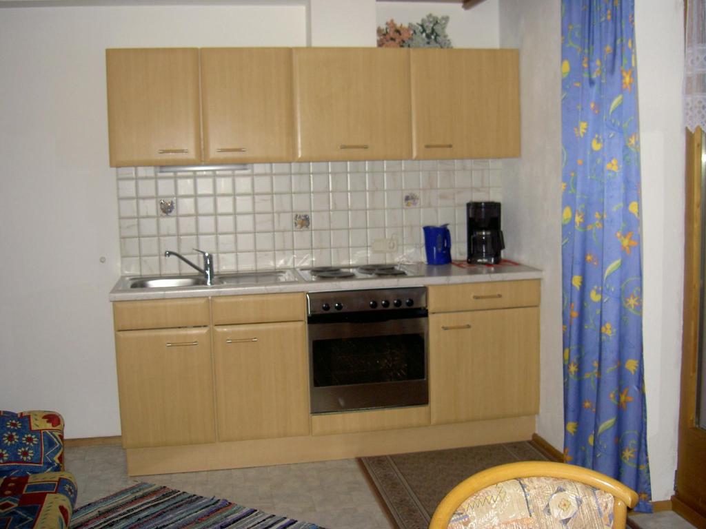 Kuchyň nebo kuchyňský kout v ubytování Ferienwohnung Aschenwald