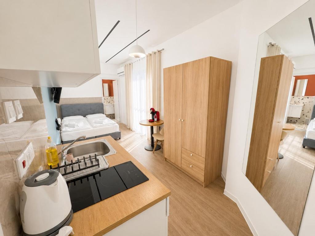 a kitchen with a sink and a counter top at Modern Studio 8 Balcony Kitchenette Bathroom in Limassol