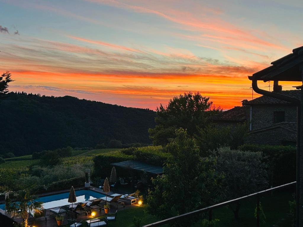 a view of a sunset from a house at Charming Tuscan Suite with Pool 2 to 5 persons Lamole Greve in Chianti in Greve in Chianti