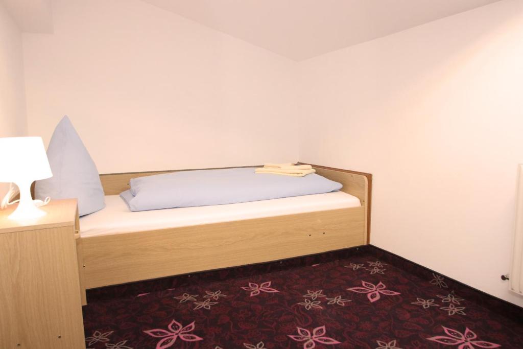 Postel nebo postele na pokoji v ubytování Haus Sonnenterrasse