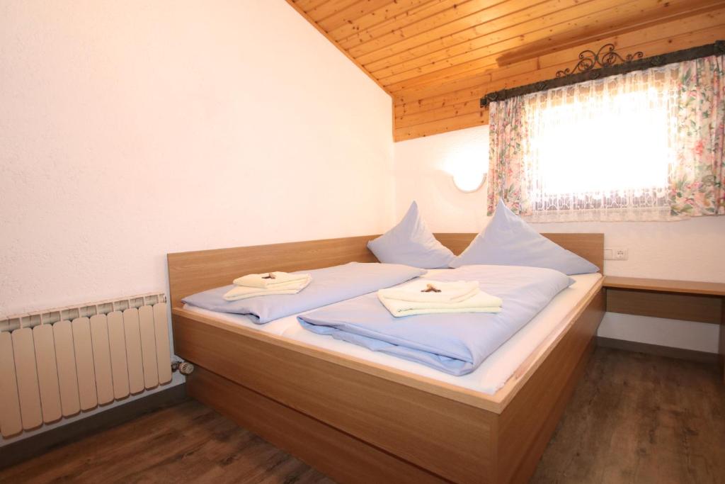 Postel nebo postele na pokoji v ubytování Haus Sonnenterrasse