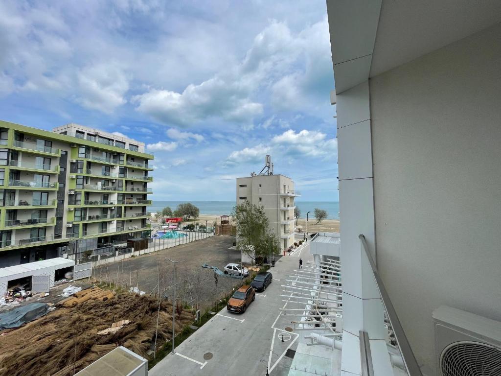a view of a city street from a building at Apartament Madagascar Hotel BS by Ella Mamaia Nord in Mamaia Sat/Năvodari
