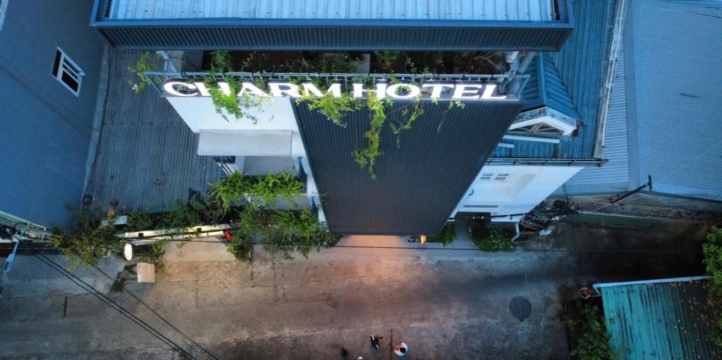 an overhead view of a building with a sign on it at The Charm Boutique Hotel Hue in Hue