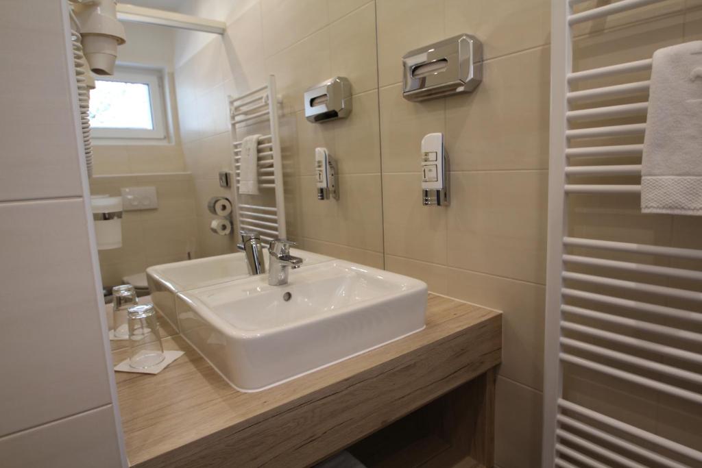 Koupelna v ubytování Burg Rooms - 24h Self-Check-in