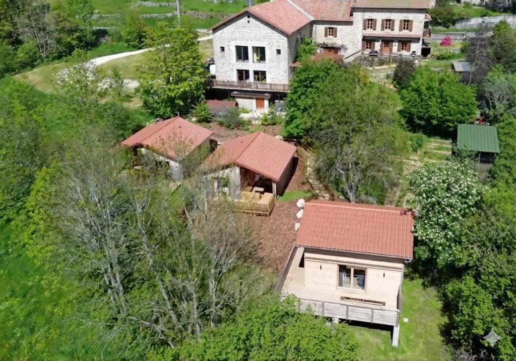 an aerial view of a house with a roof at Le Jardin des 4M in Saint-Régis-du-Coin