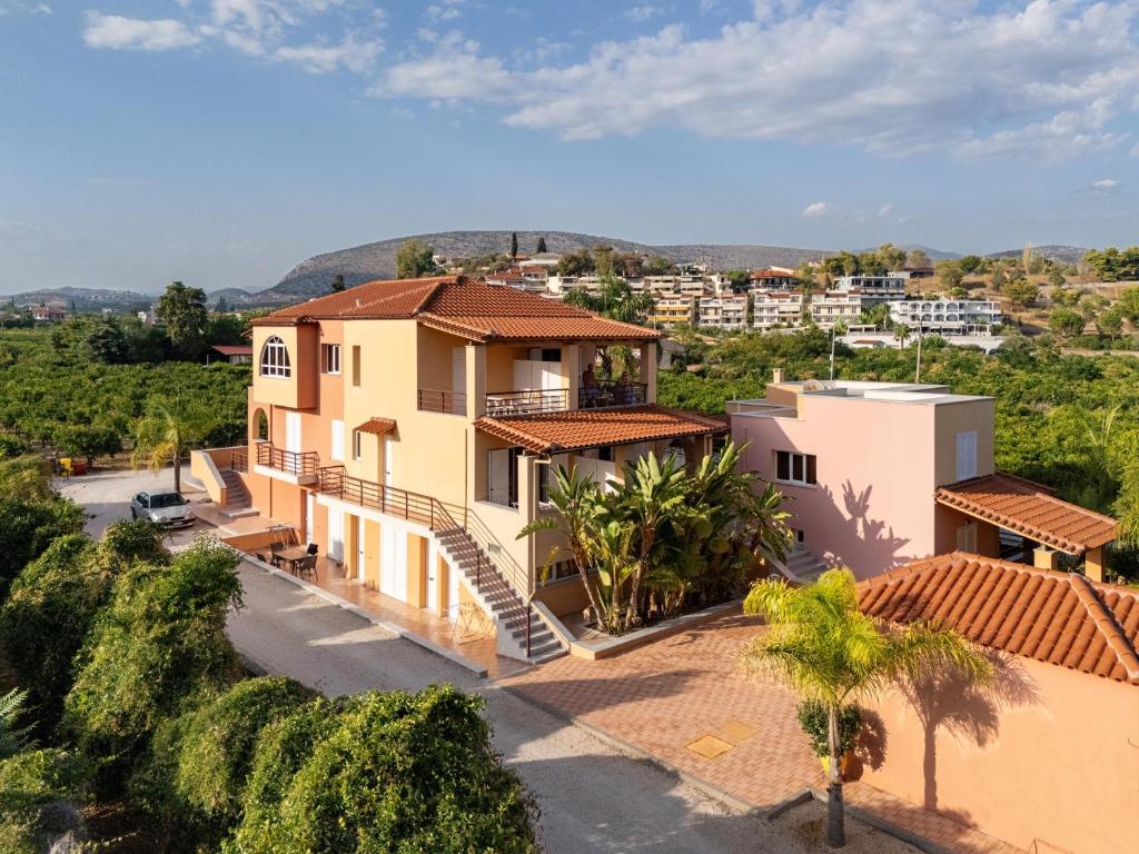 an aerial view of a house with palm trees at Maria's Filoxenia Suites in Drepana