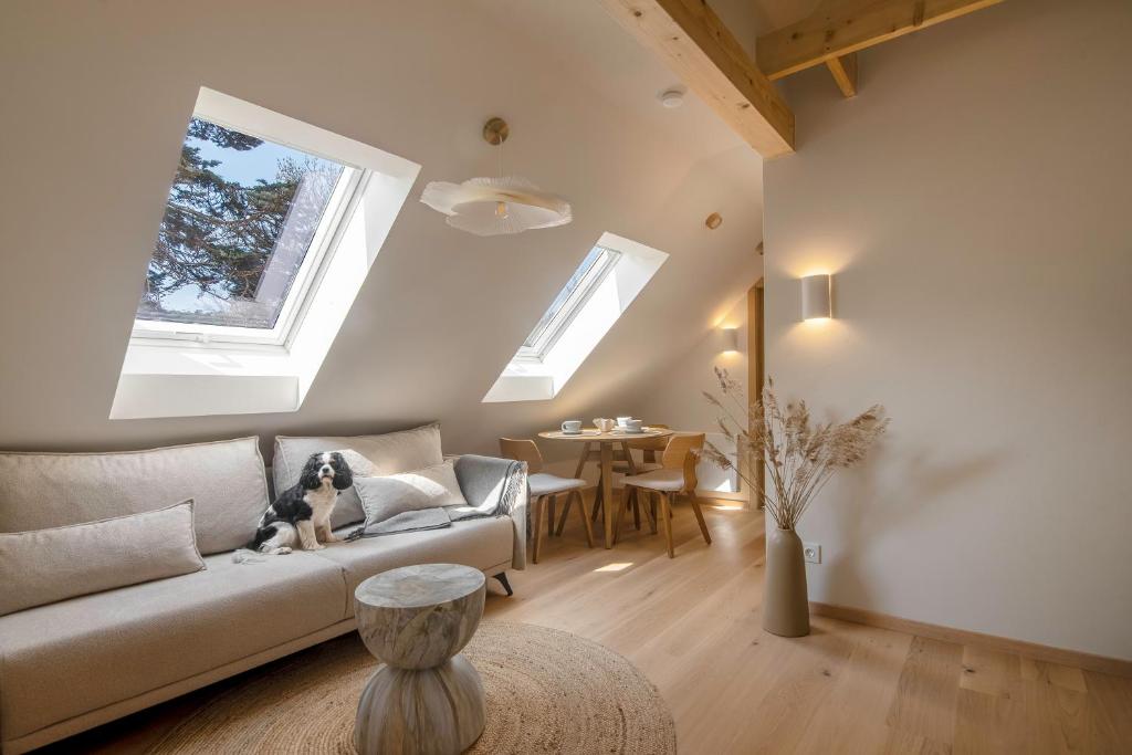 a living room with a couch and a table at Sava Nida in Neringa