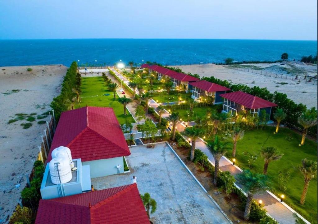an aerial view of a resort on the beach at Dusk and Dawn Beach Resort in Rāmeswaram