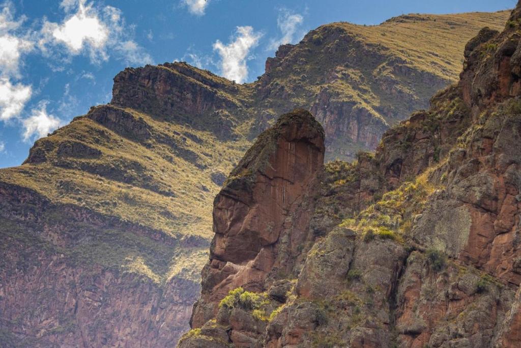 a view of a mountain with a blue sky at Awki Wasi - Sacred Valley in Lamay