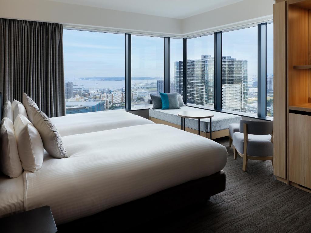 Chambre Lits Jumeaux d'Angle Deluxe avec Canapé-Lit et Baignoire avec Vue - Non-Fumeurs