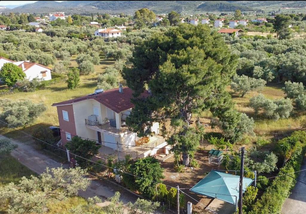 an overhead view of a house in a field at Beach Residence Walk to Beach Garden - Parking in Chalkida