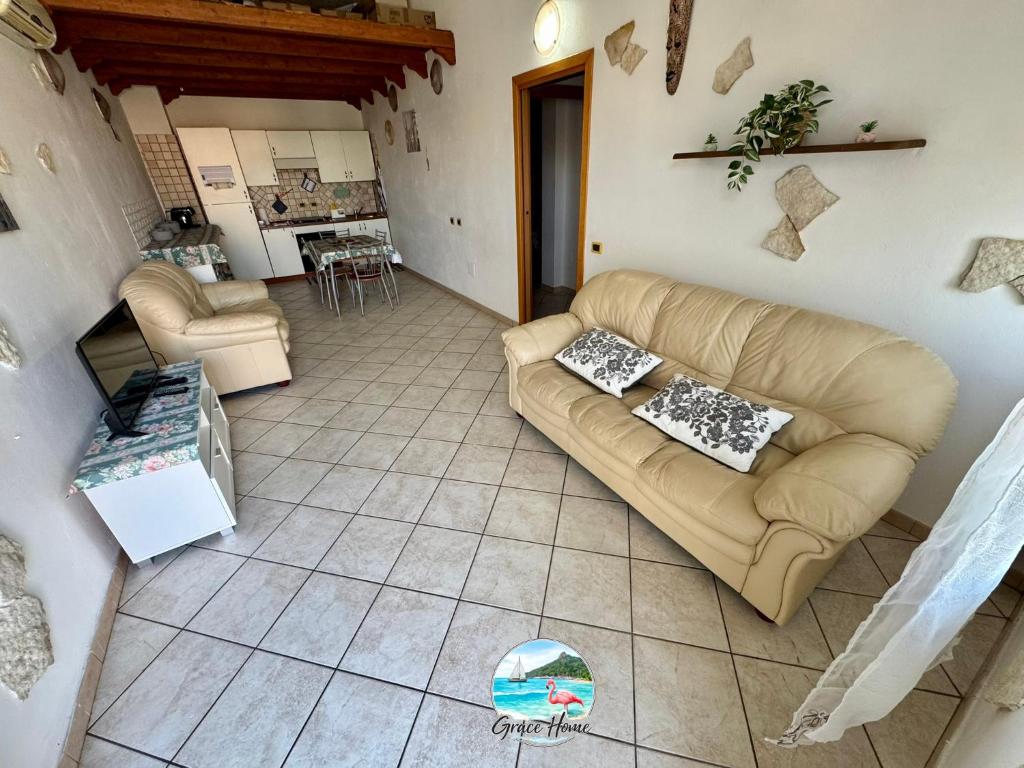 an aerial view of a living room with a couch at Grace Home in Assemini