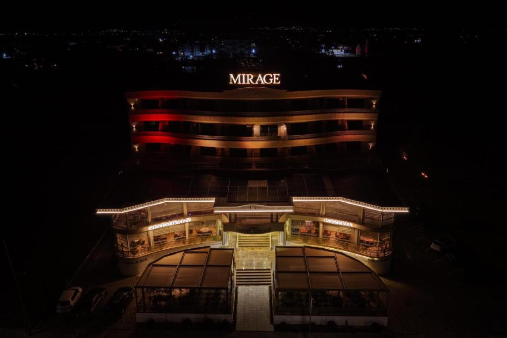 a night view of a mincex building at night at Mirage Hotel & SPA - Struga in Struga