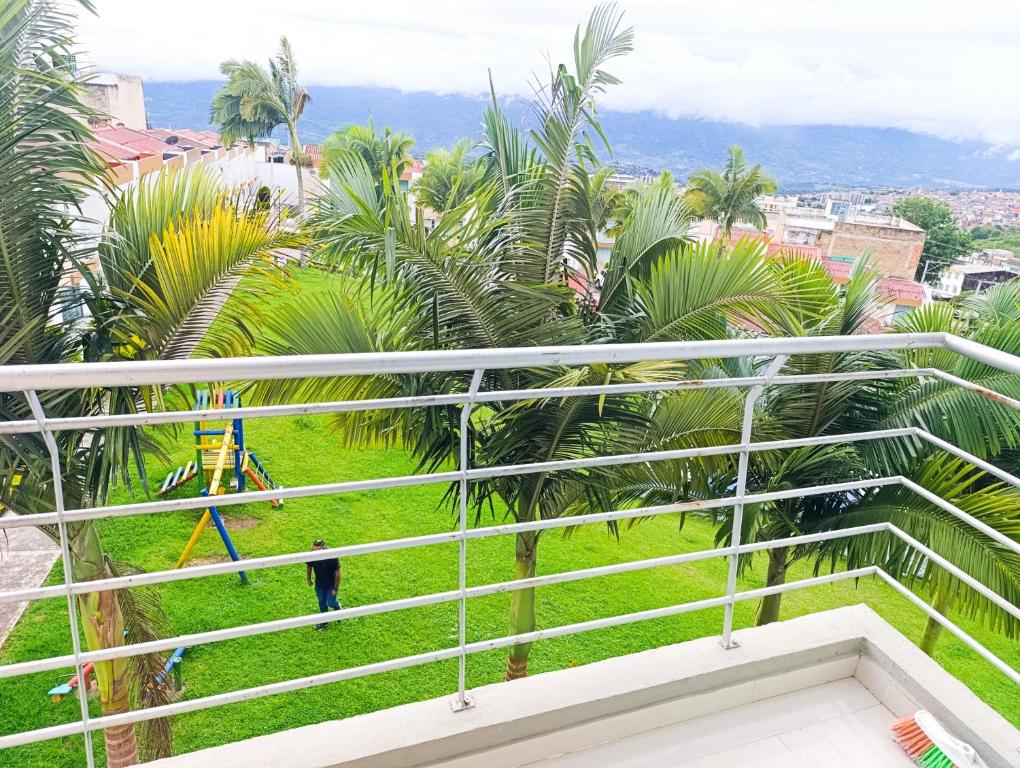 a view from the balcony of a building with palm trees at Gran Vista in Fusagasuga