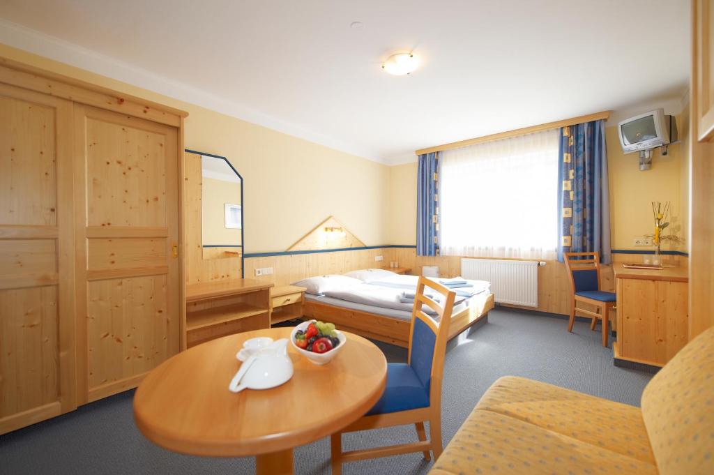 Postel nebo postele na pokoji v ubytování Hotel Hubertushof