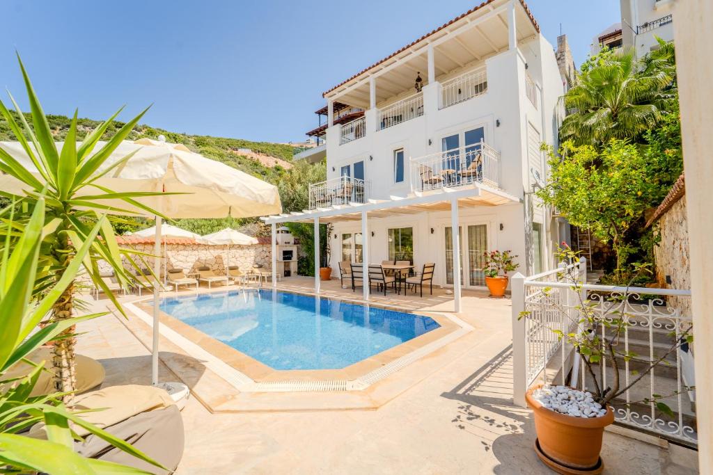 an image of a villa with a swimming pool at VILLA LEDA MARE KALKAN Sea View, Private Pool & Beach Clubs in Kalkan