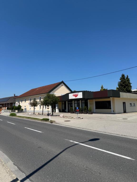 a building on the side of a street at Gästehaus Stögmüller in Asten