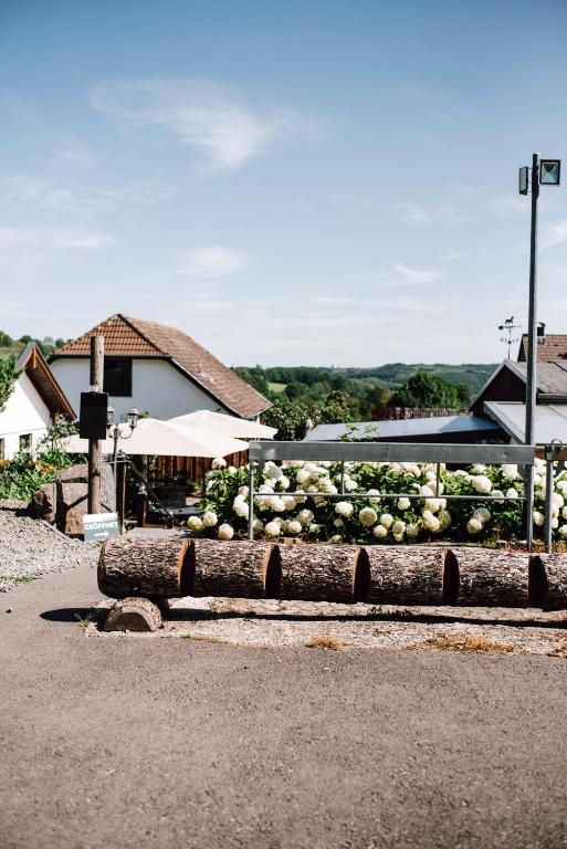 a pile of melons sitting on the side of a road at Übernachten im Café Restaurant Vedder in Herscheid