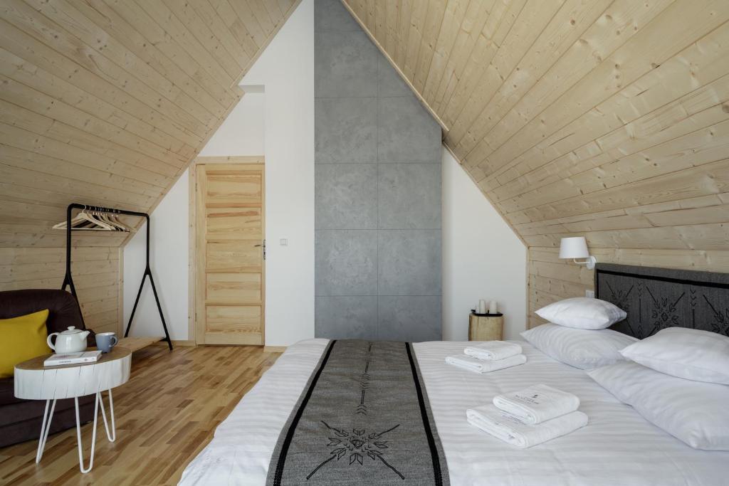 Posteľ alebo postele v izbe v ubytovaní Tatra Wood House