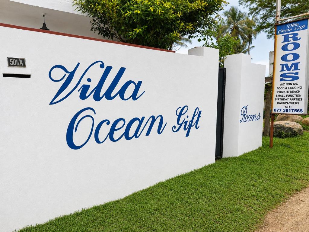 a sign for a villa ocean set at Villa Ocean Gift in Galle