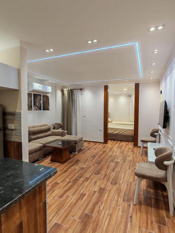 a living room with a couch and a table at LuXURY STUDIOS MATROUH 3 in Marsa Matruh