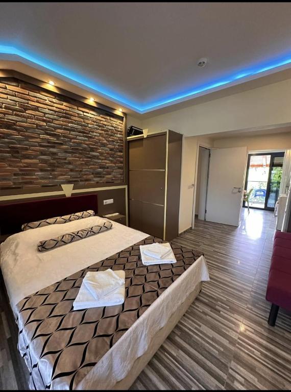 Krevet ili kreveti u jedinici u okviru objekta Hotel Falcon Home