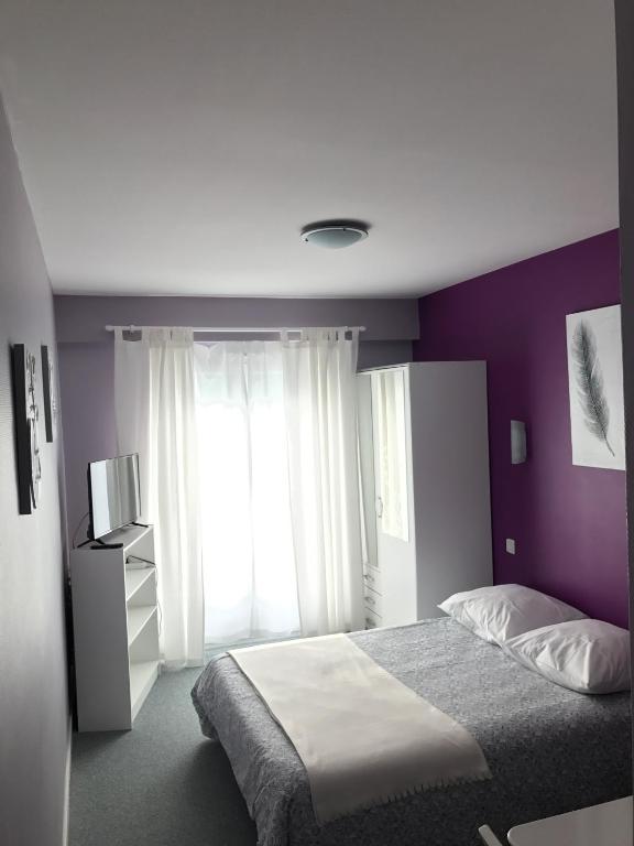 Postel nebo postele na pokoji v ubytování Hôtel du Littoral