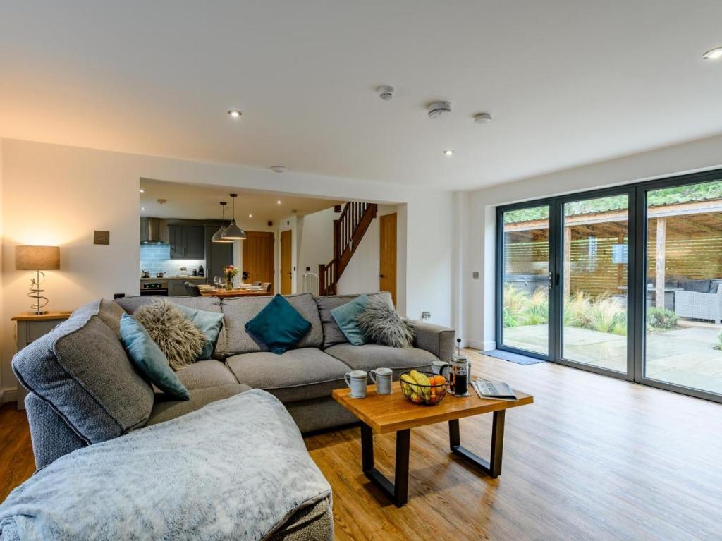 a living room with a couch and a table at 2 Bed in Weymouth oc-75201 in Weymouth
