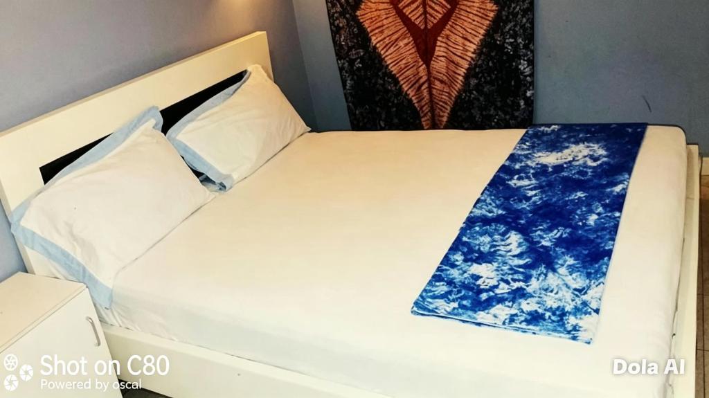 Katil atau katil-katil dalam bilik di Cutting Edge Guest House