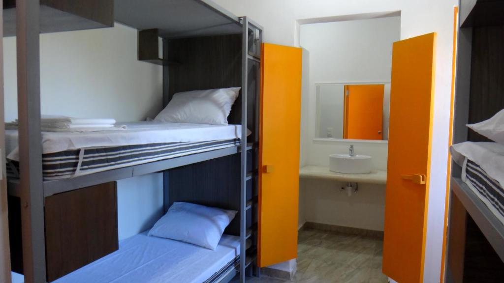 Postel nebo postele na pokoji v ubytování Hostel Humanity