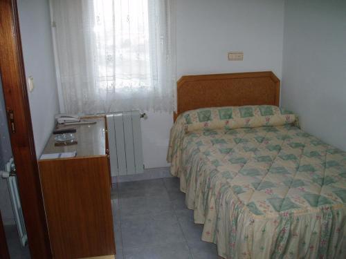 Postel nebo postele na pokoji v ubytování Hotel Buenos Aires