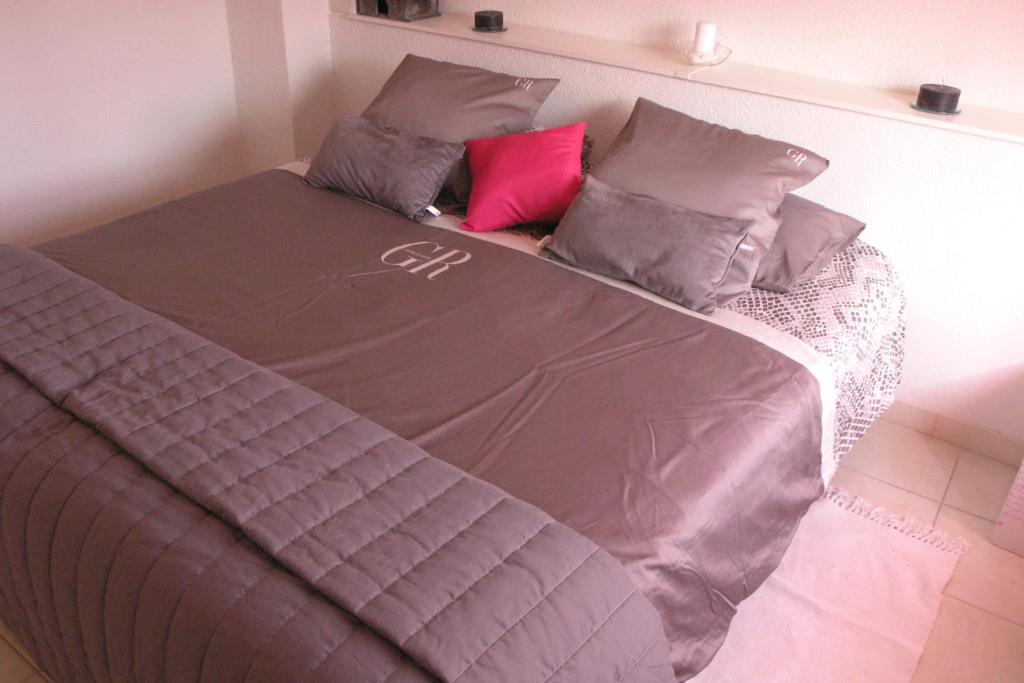 Postel nebo postele na pokoji v ubytování Les Jardins d'Avene