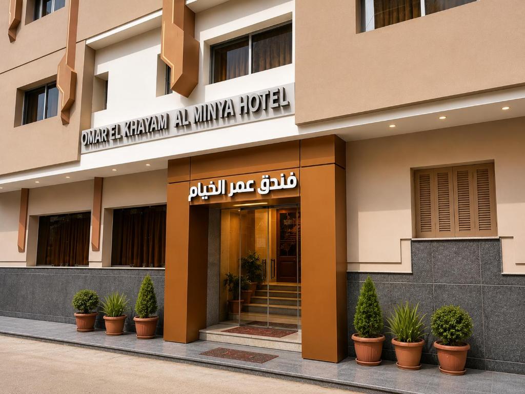 a lobby of a hotel with plants in front of it at Omar El Khayam Al Minya Hotel - Luxury Accommodation in Minya