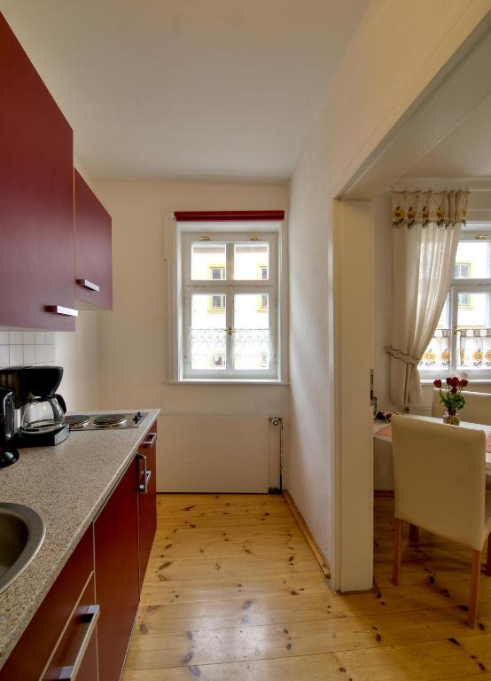 Kuchyň nebo kuchyňský kout v ubytování Appartementhaus am Schloss
