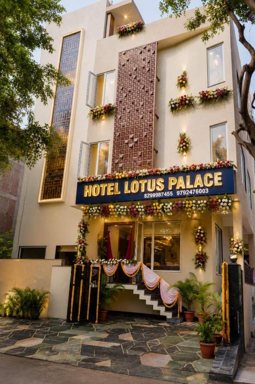 a hotel lobby with a hotel lotus palace at Hotel Lotus Palace in Lucknow