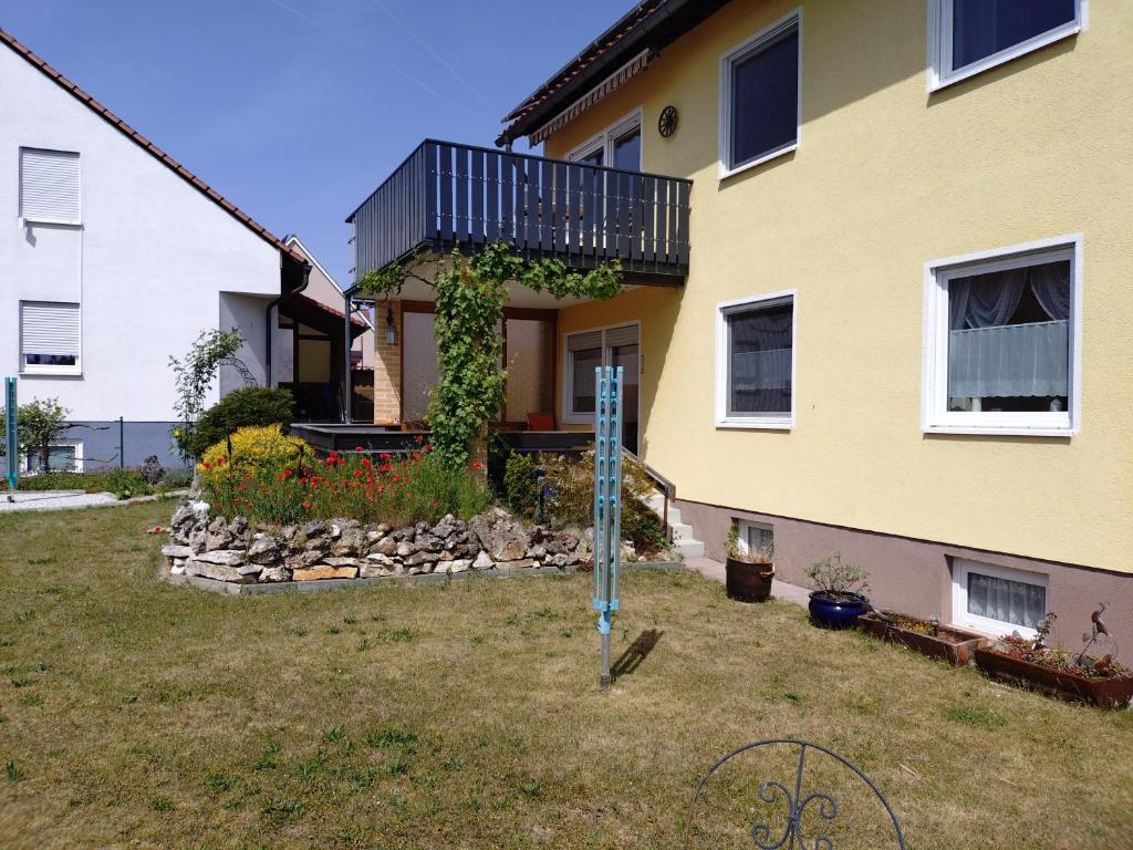 a house with a sign in front of it at FEWO Stephan Grünewald in Gunzenhausen