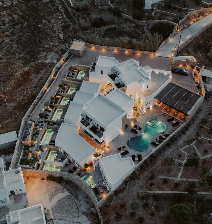 an overhead view of a building with a pool at Kalea Mykonos in Ornos