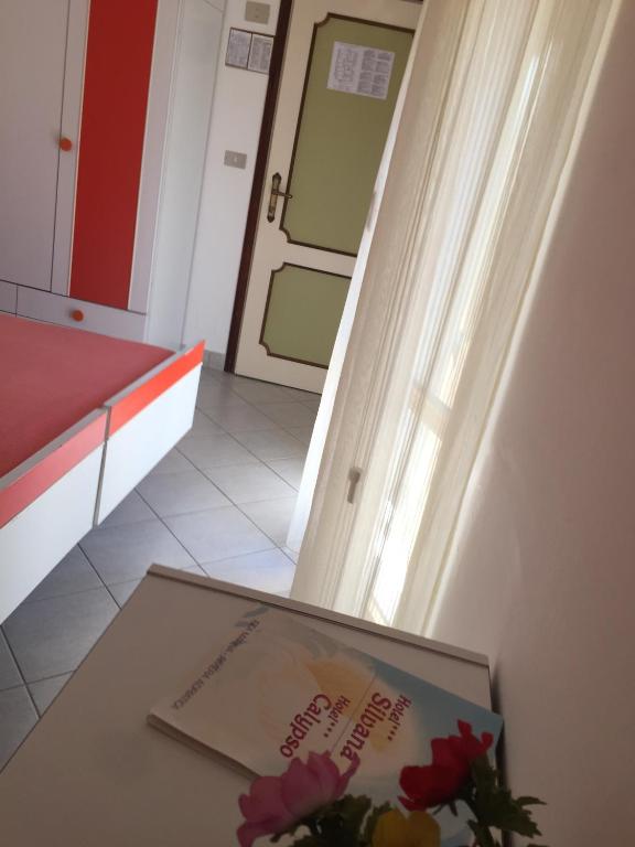 Postel nebo postele na pokoji v ubytování Hotel Calypso