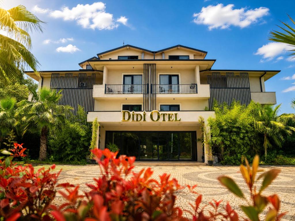 a building with a sign that reads dirt officer at Didi Hotel Sapanca in Sapanca