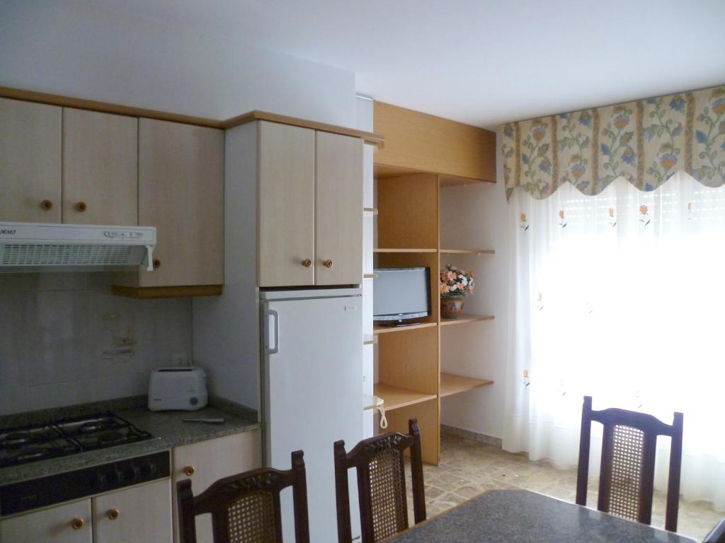 Kuchyň nebo kuchyňský kout v ubytování Apartamentos Solmar