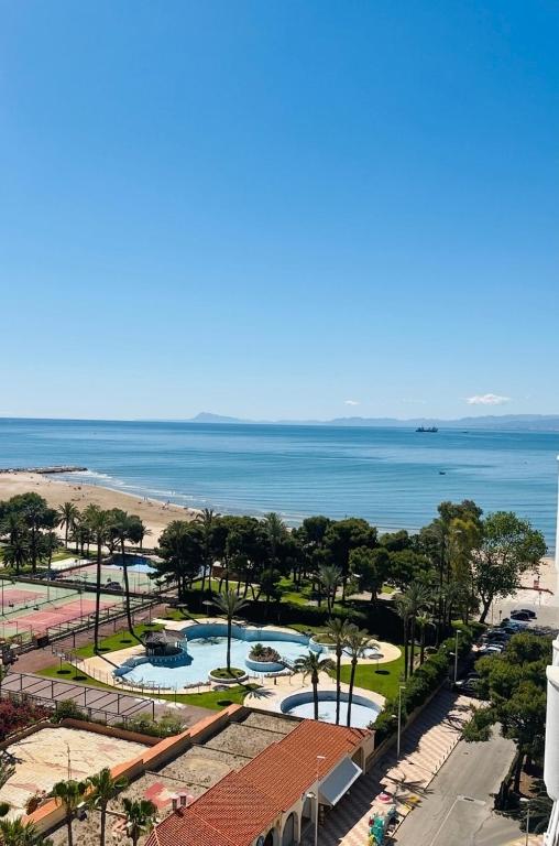an aerial view of a resort with a beach at Ático vistas al mar in Cullera