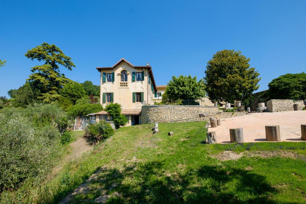 an old house on top of a hill at Villa Cristani in Pedemonte