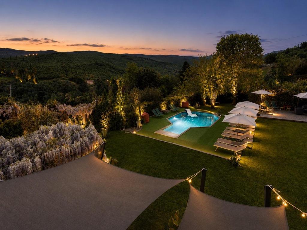 an aerial view of a backyard with a swimming pool at Gan Eden B&B in Monterenzio