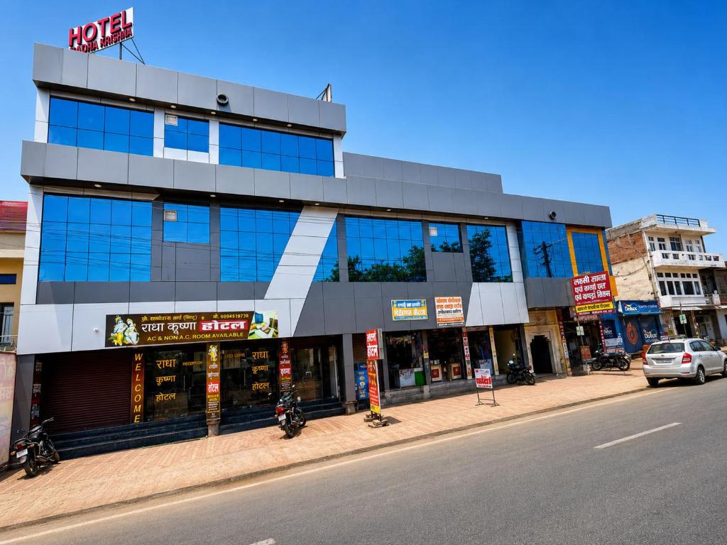 a building on the side of a city street at Radha Krishna Hotel in Karauli