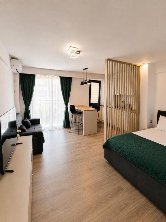 a hotel room with a bed and a living room at Asi Marine Rentals in Saturn