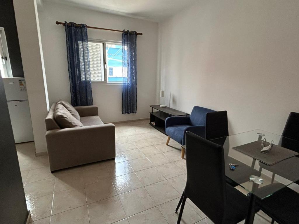 a living room with a couch and chairs and a table at Lica in Espargos